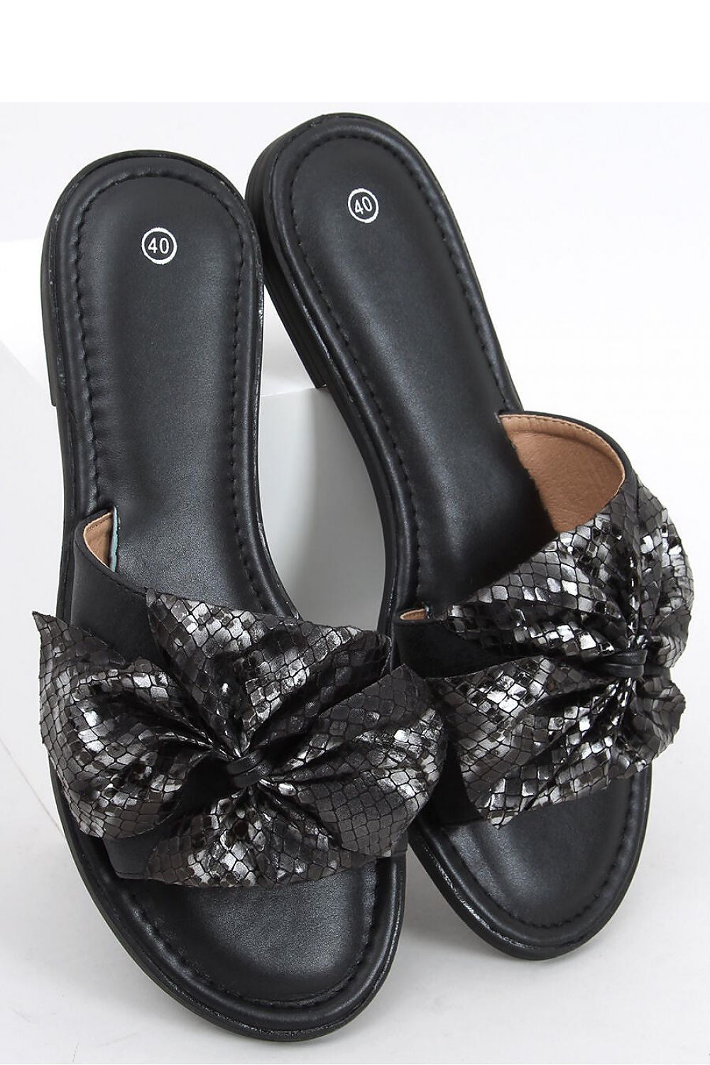 Clacquettes model 164490 Inello