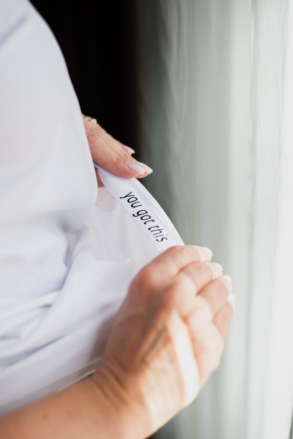 Exemple de petit message imprimé à l'intérieur du t-shirt Boobs